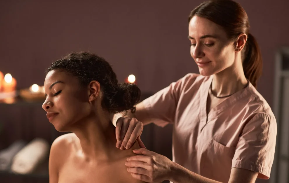 Masseuse Kneading Shoulders